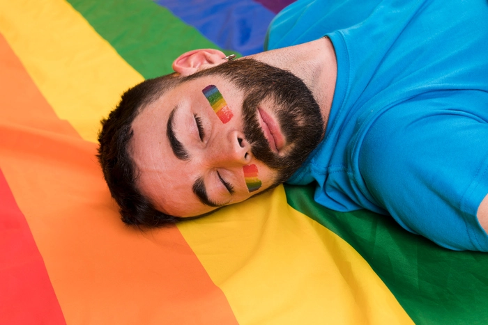 Pride flag and young man
